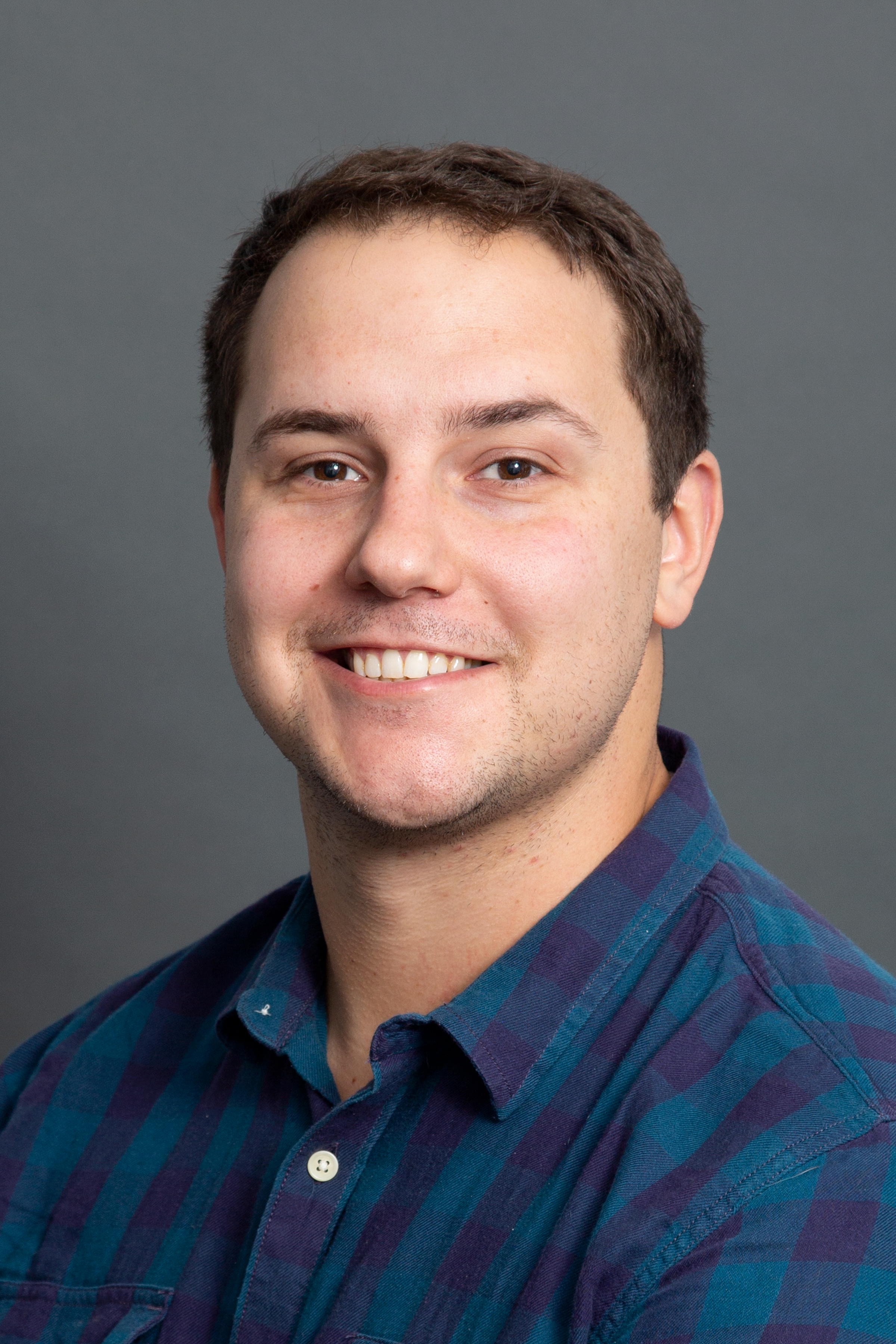 Headshot of Justin Guinn